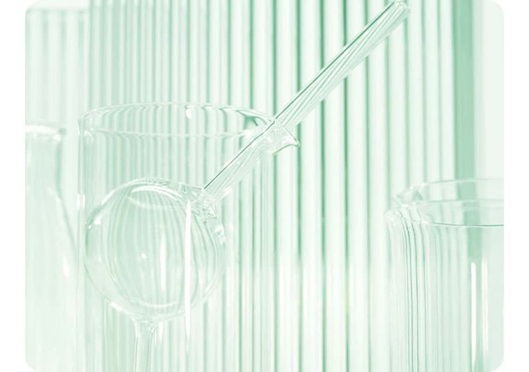 Background image containing selection of dermatologist glass vials in different shapes